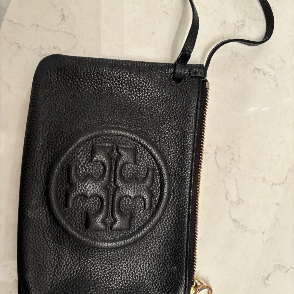 Tory Burch black leather wristlet - excellent condition.
